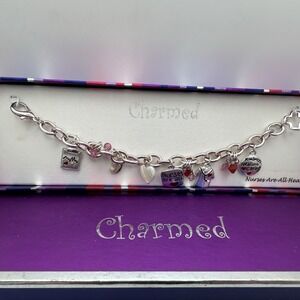 New Charmed AJMC Nurse Charm Bracelet Silver Tone Heart Medical 7.5"